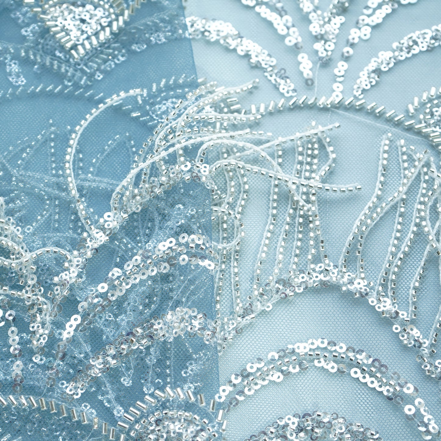 Teal Blue Cutdana Hanging Embroidery Net Fabric