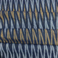 Navy Blue With Golden Ikkat Print Cotton Fabric