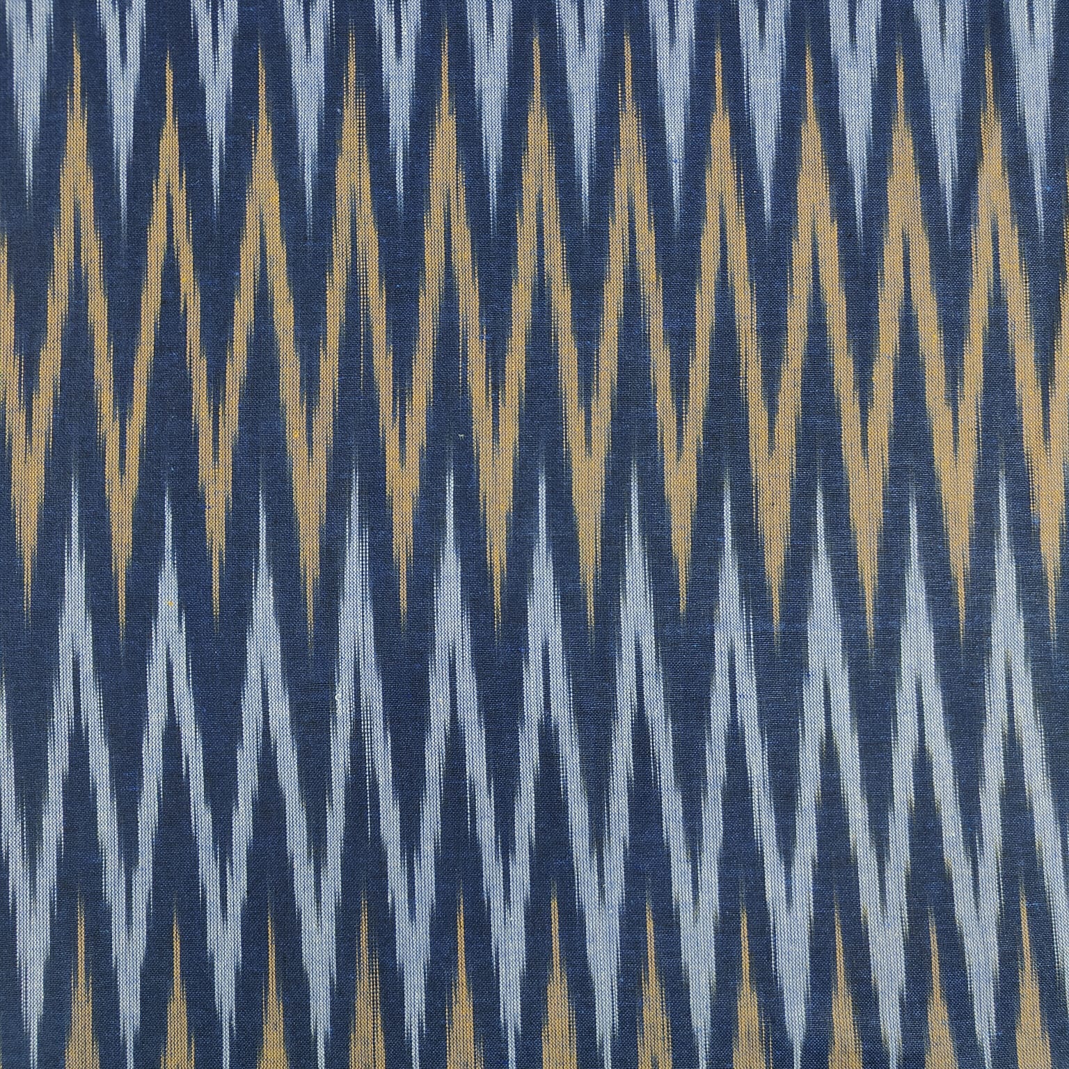 Navy Blue With Golden Ikkat Print Cotton Fabric