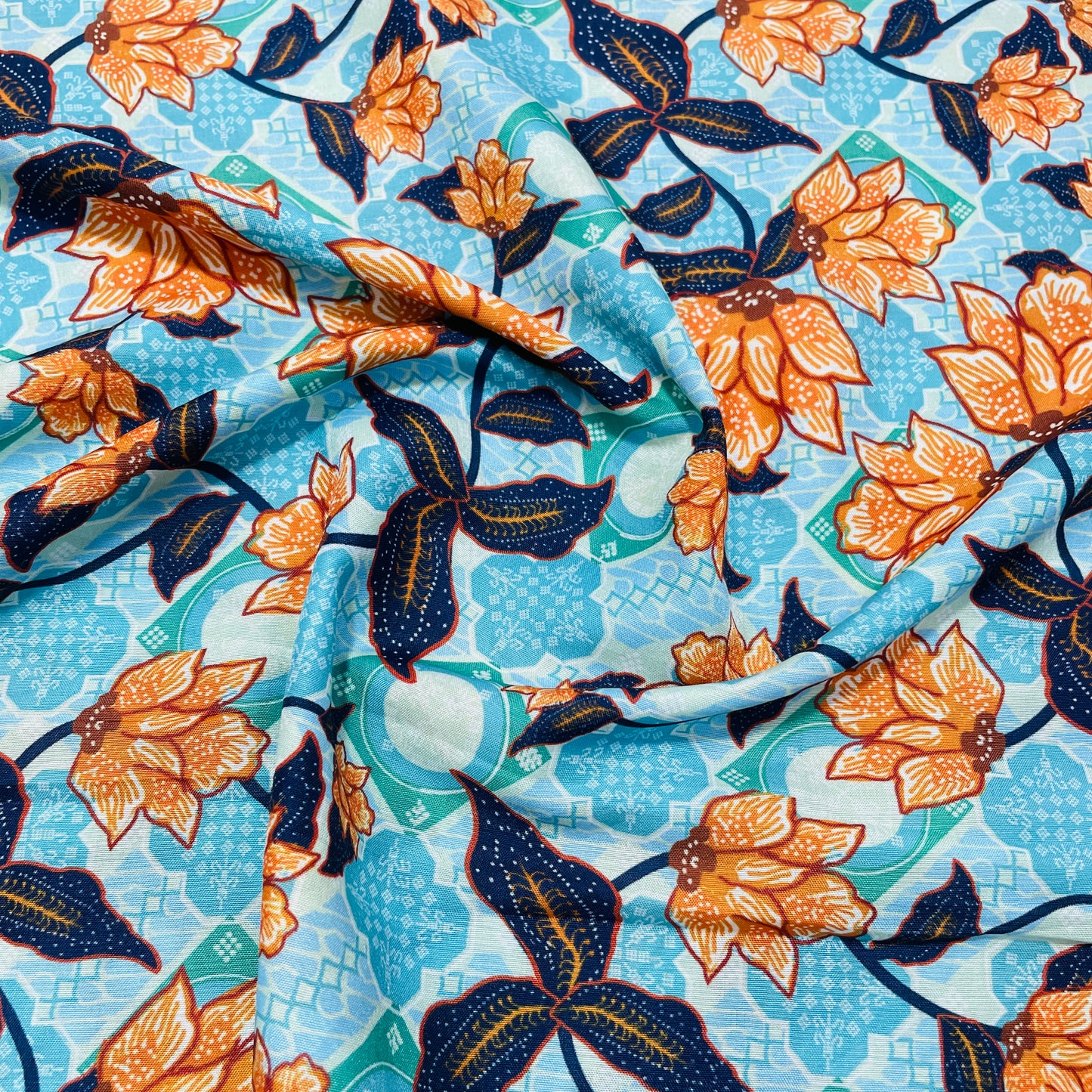 Sea Green Orange Hakokai Batik Floral Print Muslin Fabric - TradeUNO