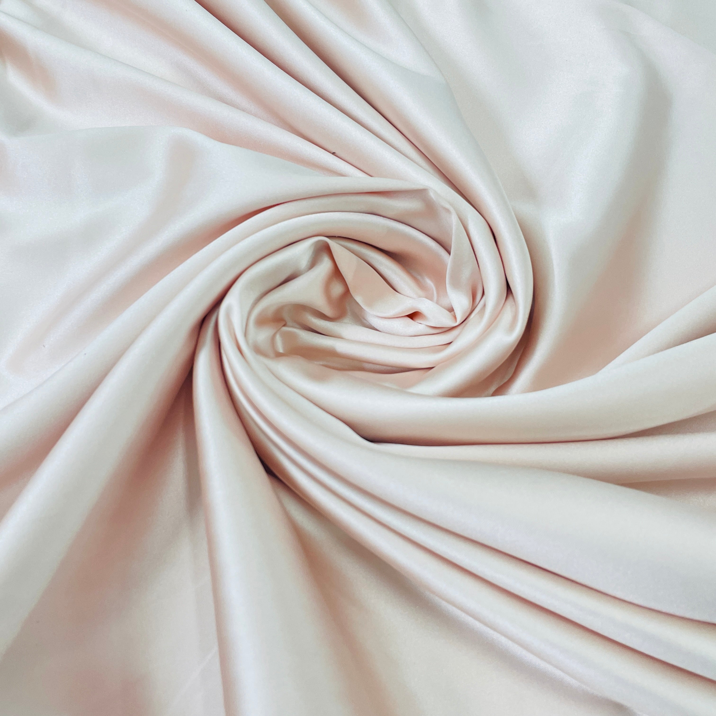 Buy Exclusive Peach Pink Solid Celina Satin With Lycra Fabric