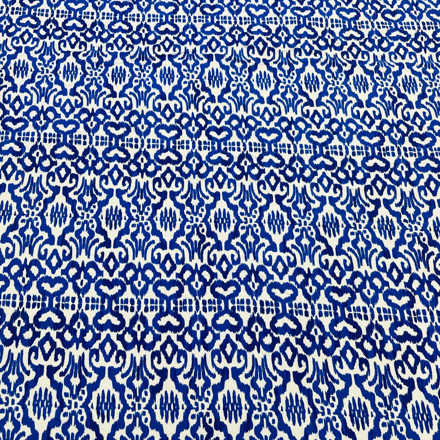 White & Blue Ikkat Print Crepe Fabric