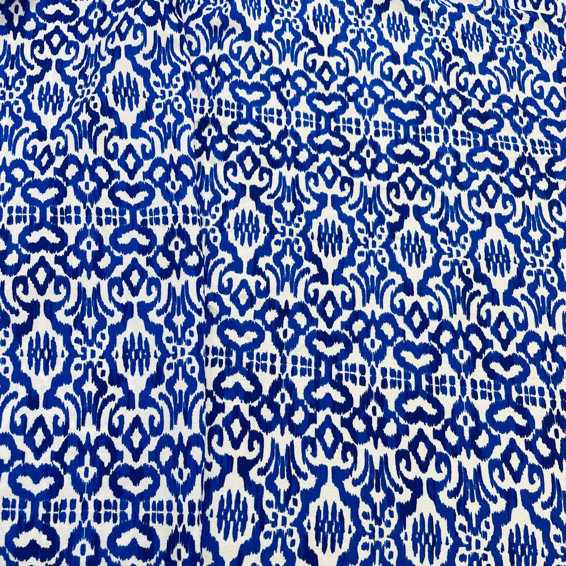 White & Blue Ikkat Print Crepe Fabric