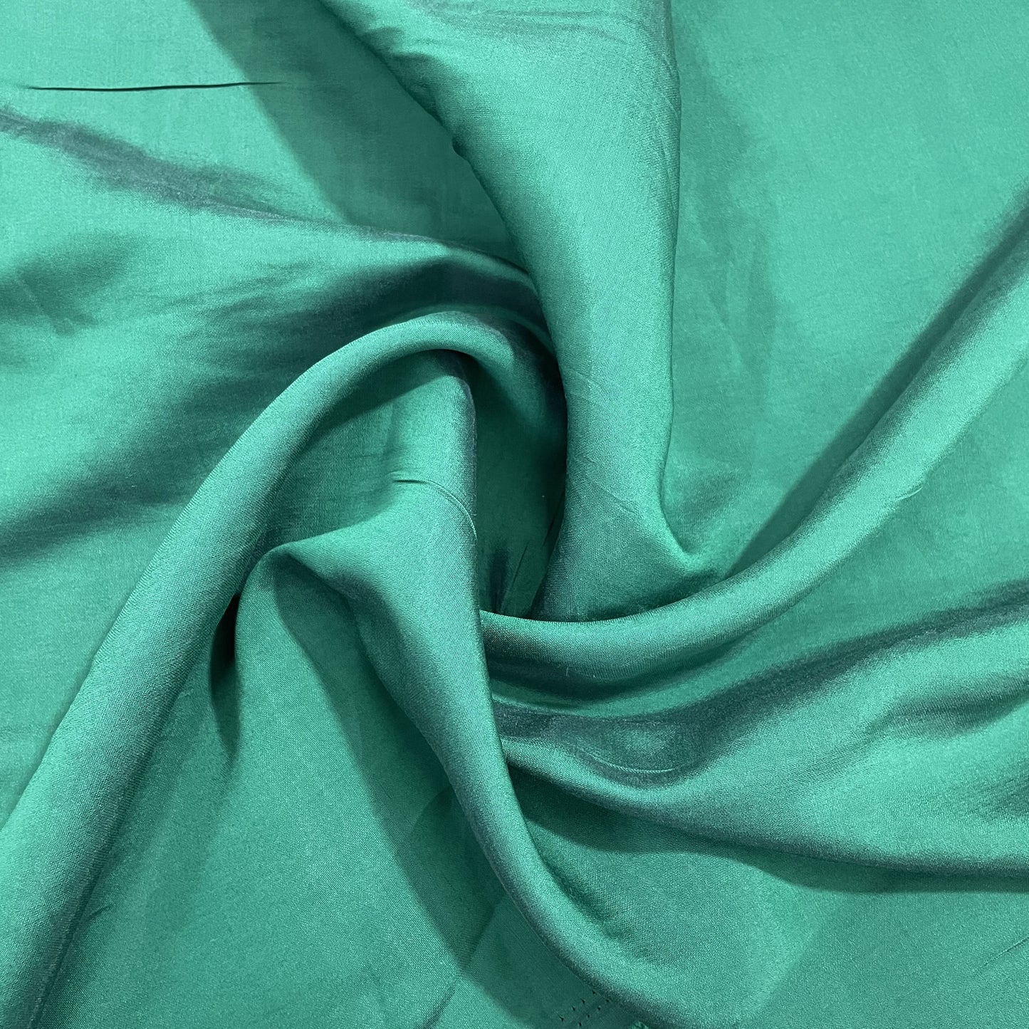 Buy Dark Green Solid Knitted Lycra Fabric Online – TradeUNO Fabrics