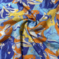 Blue Multicolor Abstract Print Muslin Fabric