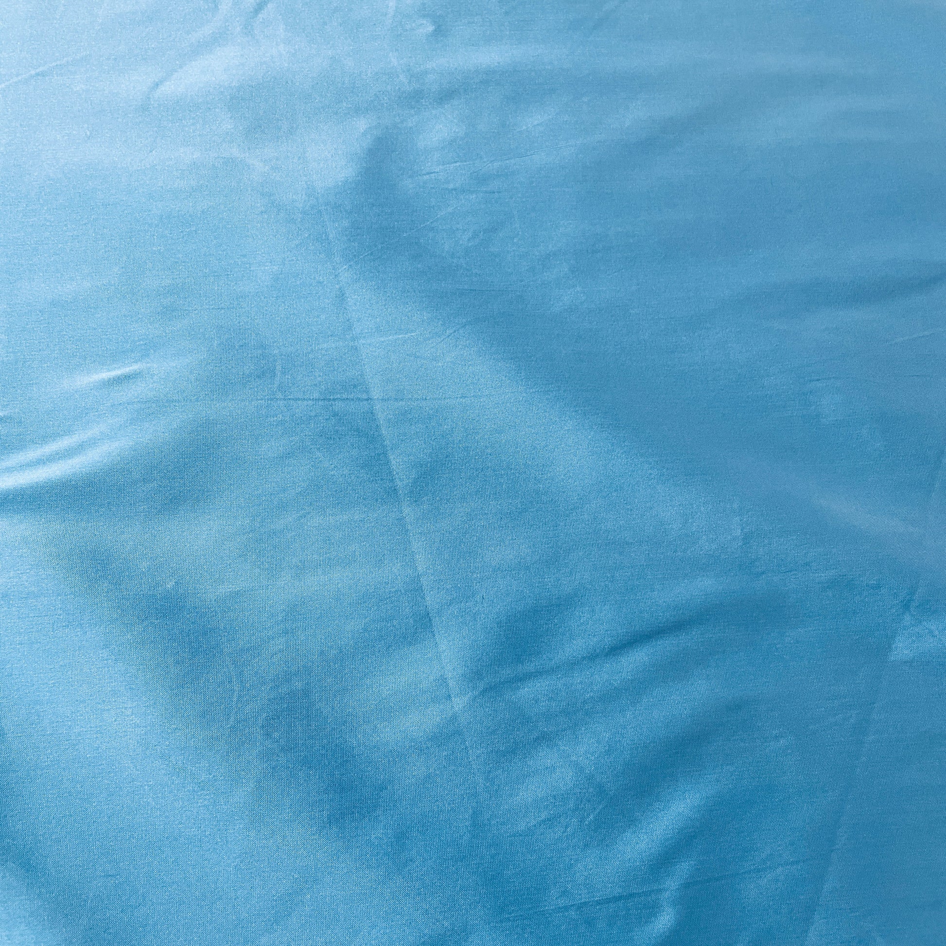 Buy Sky Blue Solid Silk Taffeta Fabric Online – TradeUNO Fabrics
