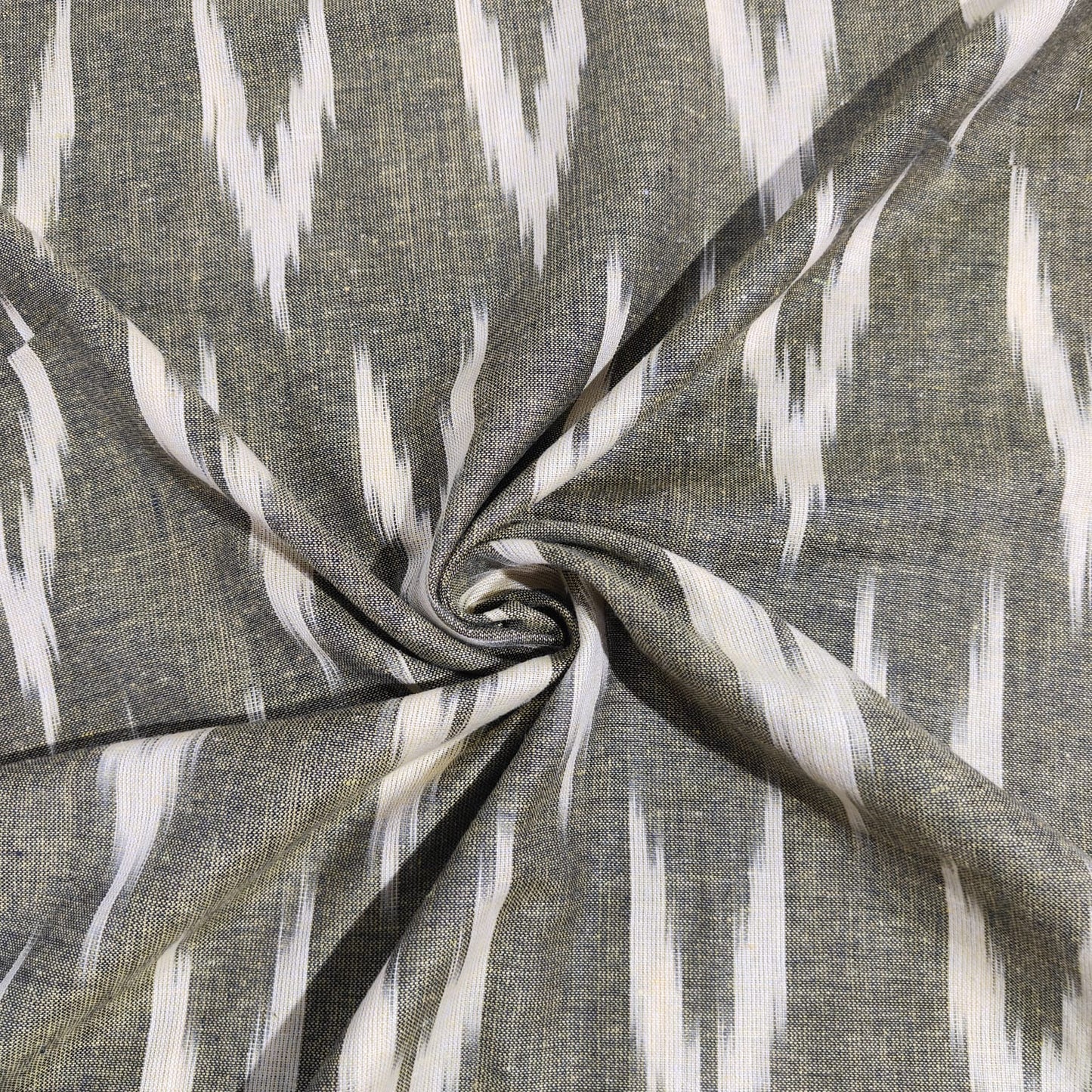 Olive Green With Cream Ikkat Print Cotton Fabric