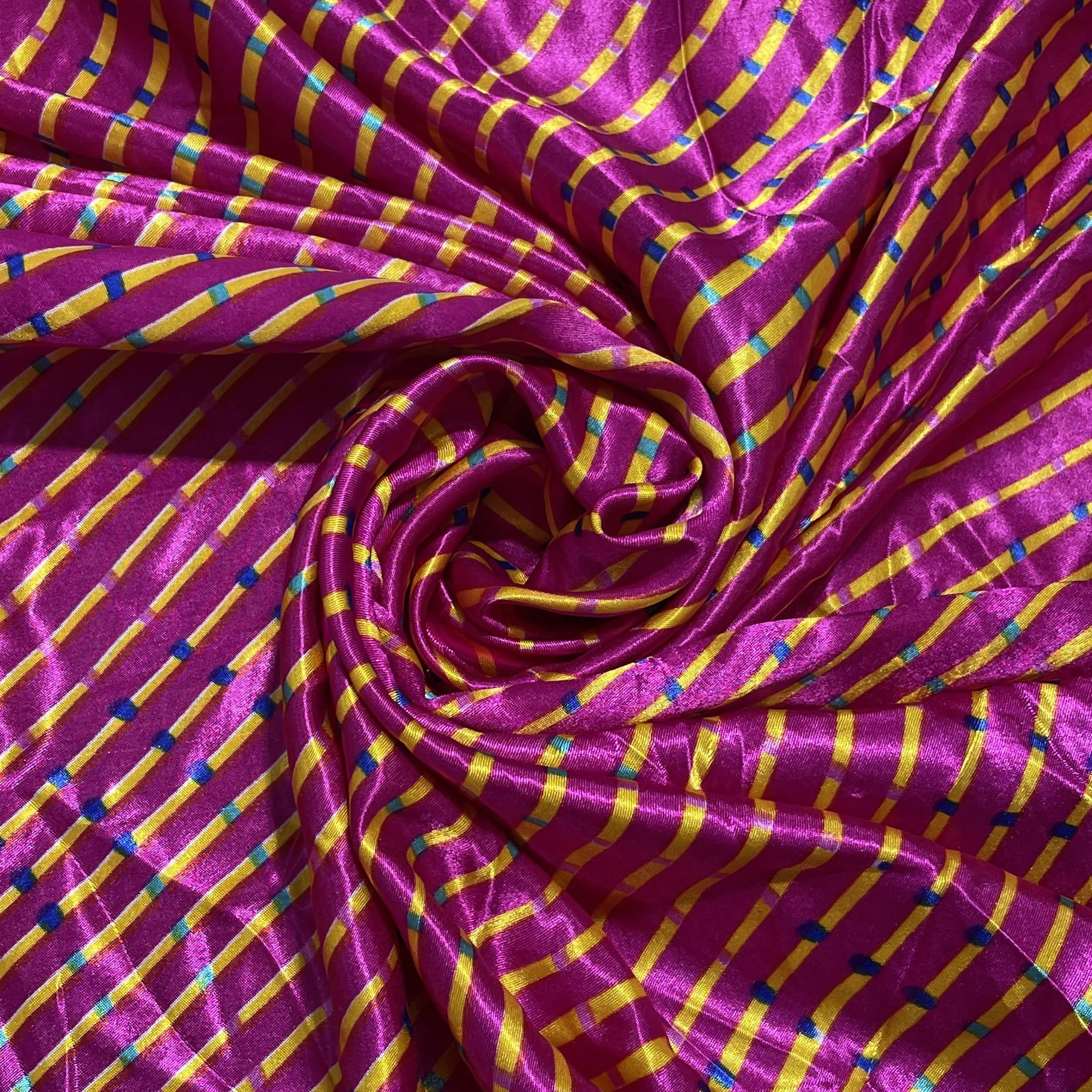 Buy Premium Pink Lehariya Print Satin Fabric Online – TradeUNO Fabrics