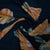 Black With Orange Floral Crepe Fabric - TradeUNO